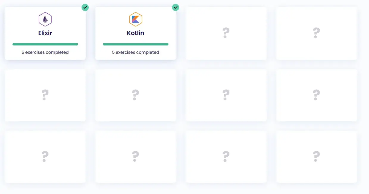 A screenshot of Exercism's #12in23 dashboard. Twelve grid squares are visible.
Two are completed with Kotlin and Elixir. The remaining are
empty.