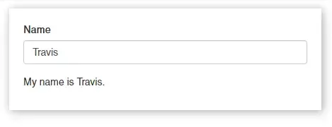 An example React app with an text input for “Name”. The name “Travis” is input. The text “My name is Travis.” appears below the input.