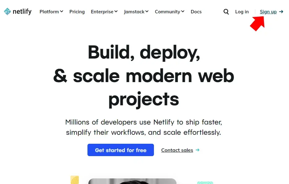 The Netlify homepage. A red annotation arrow points to “Sign
up”.