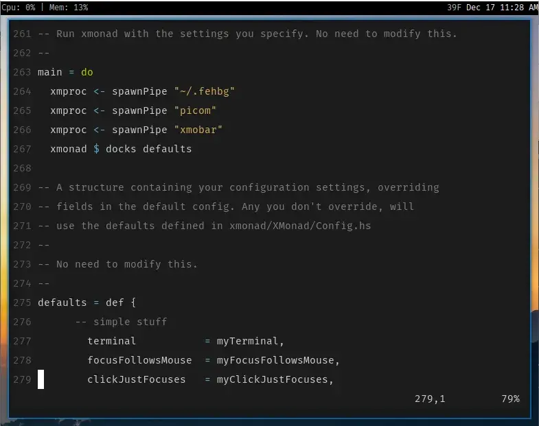 The same Vim editor with xmonad configuration file open, but this time there's
syntax highlighting.