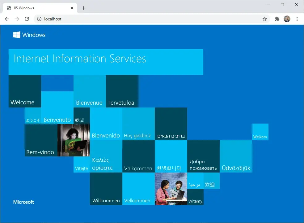 A Chrome web browser opened to localhost. The default IIS homepage is visible.
The words “Windows”, “Internet Information Services”, and “Welcome” (in multiple
languages) is visible on a blue background.