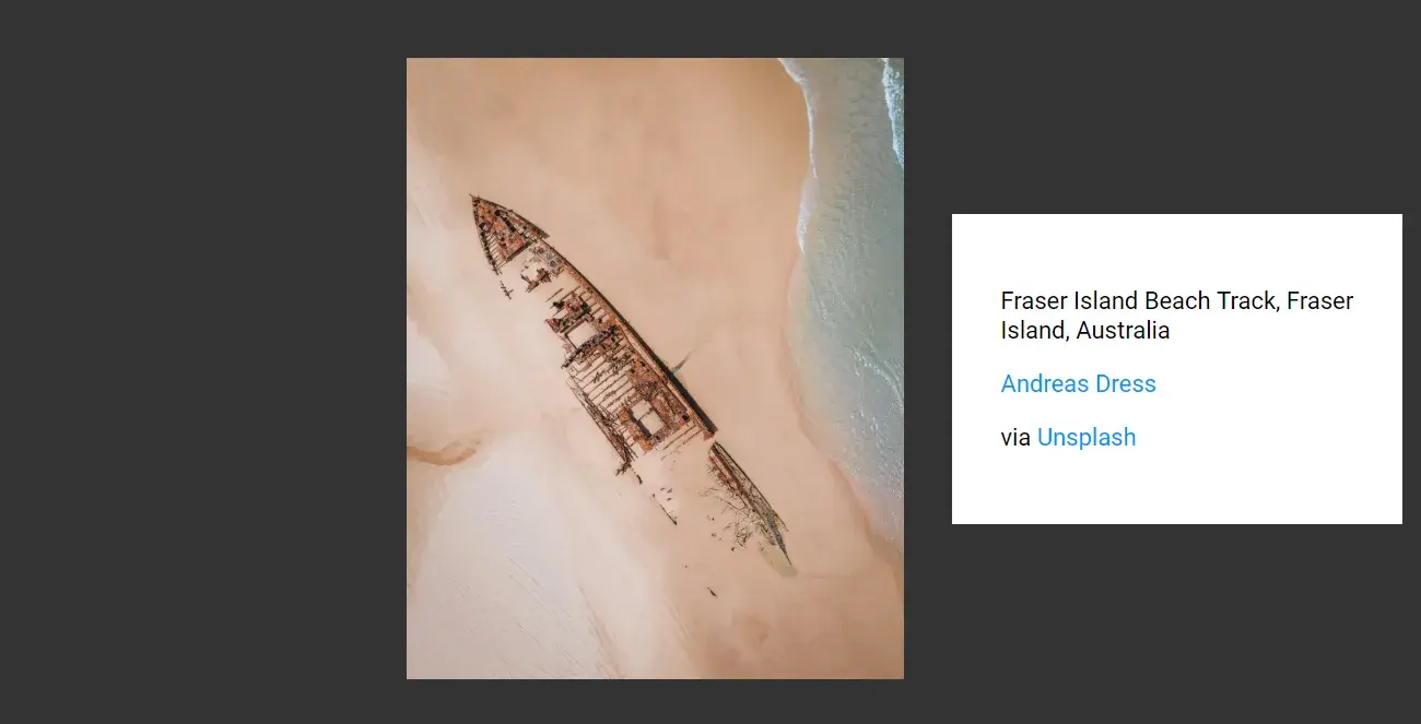 The same page, but the info box is enhanced. Instead of the word “Info”, it
says “Fraser Island Beach Track, Fraser Island, Australia. Andreas Dress. via
Unsplash.”