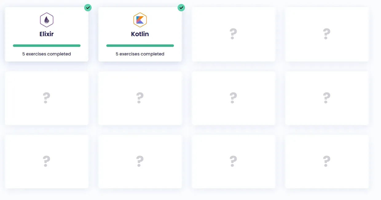 A screenshot of Exercism's #12in23 dashboard. Twelve grid squares are visible.
Two are completed with Kotlin and Elixir. The remaining are
empty.