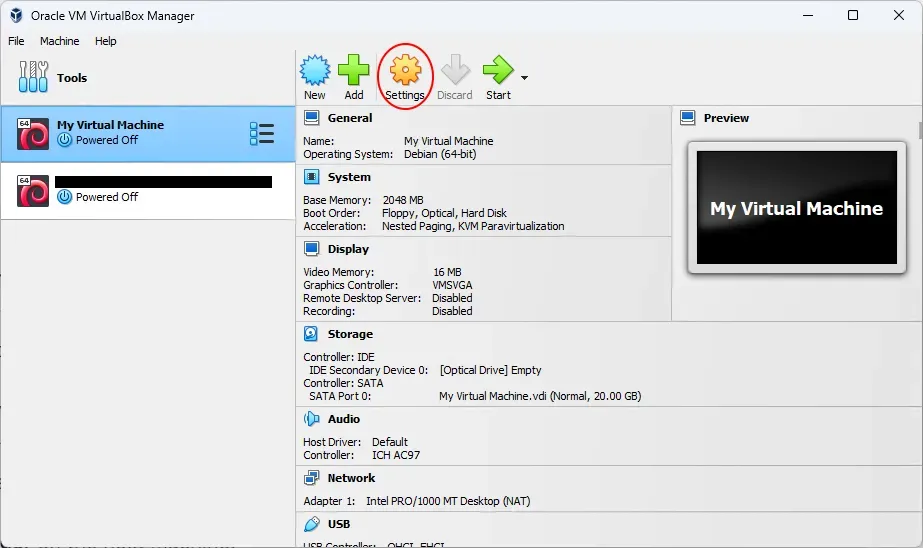 Screenshot of VirtualBox. A virtual machine is highlighted. A red annotation
circle surrounds the Settings
button.