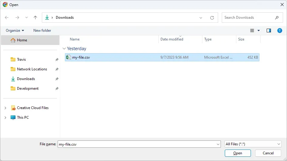 The Windows file chooser open to the user's Downloads directory. A file called
my-file.csv is visible.