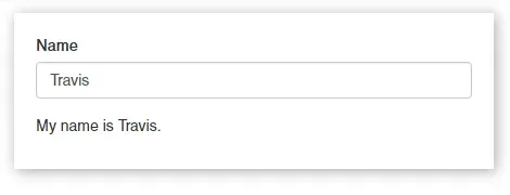 An example React app with an text input for "Name". The name "Travis" is input. The text "My name is Travis." appears below the input.