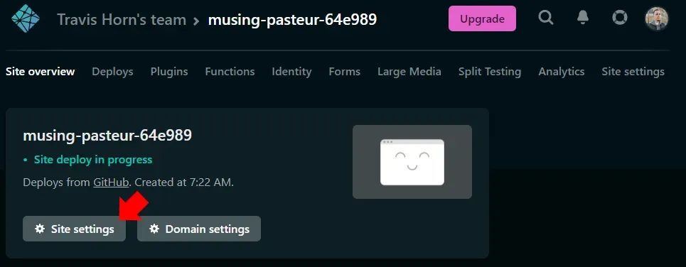 The Netlify project dashboard. A red annotation arrow points to the "Site
settings" button.